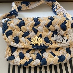 Lele Sadoughi braided Lyle bag.